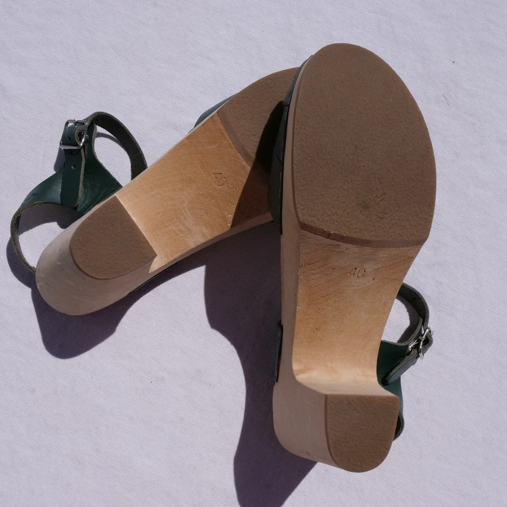 Modern Swedish Hasbeens green leather peep toe high wooden platform sandals